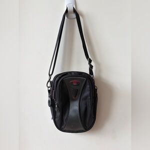 Tumi T-Tech sling bag with multiple compartments and Keychain mens